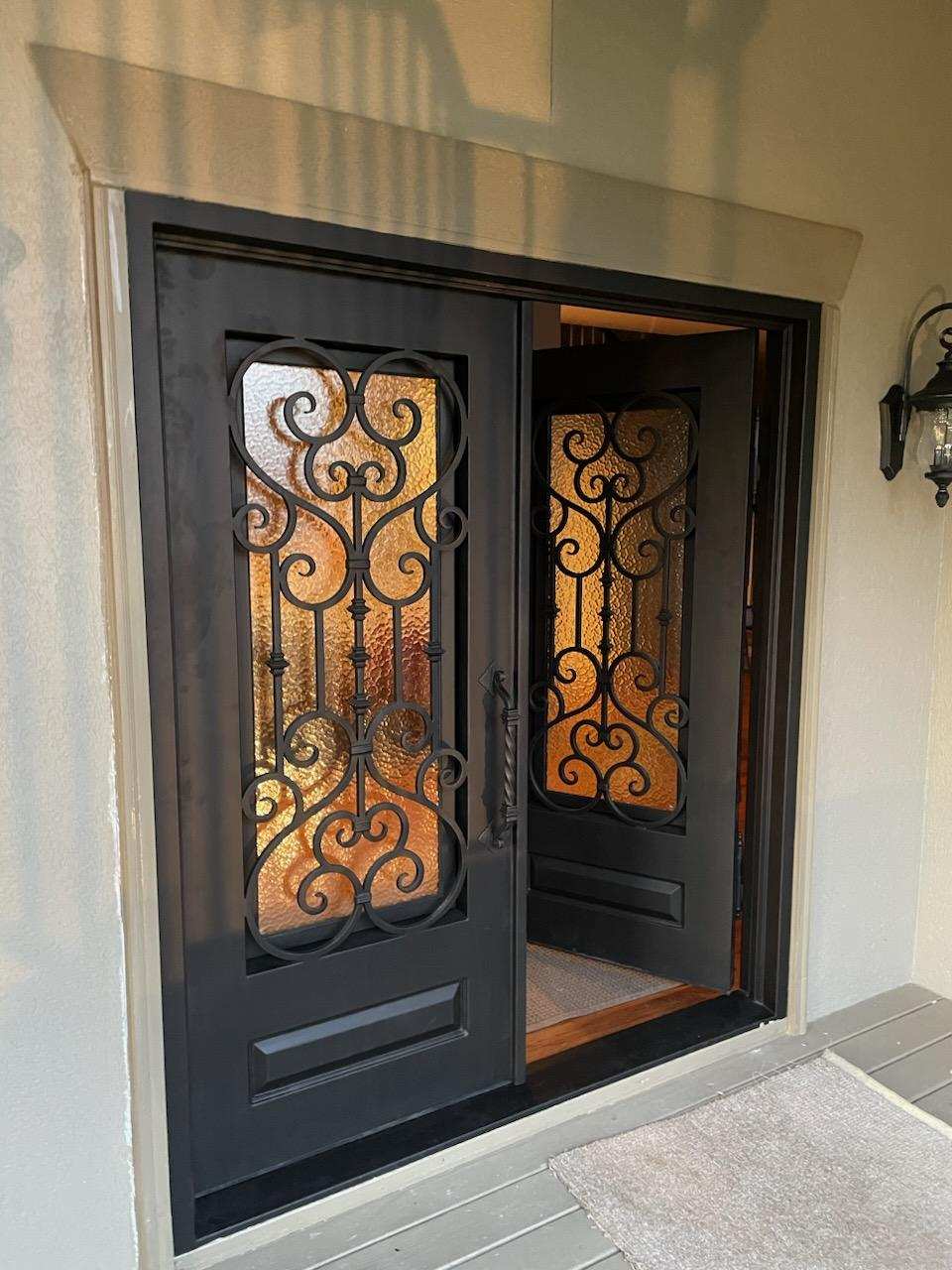 Bellmead Model Double Front Entry Iron Door With Tempered Water Cube Glass Dark Bronze Finish