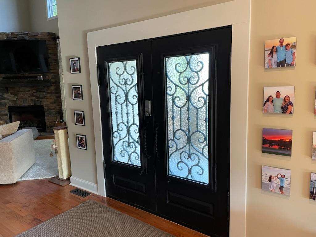 Bellmead Model Double Front Entry Iron Door With Tempered Water Cube Glass Dark Bronze Finish