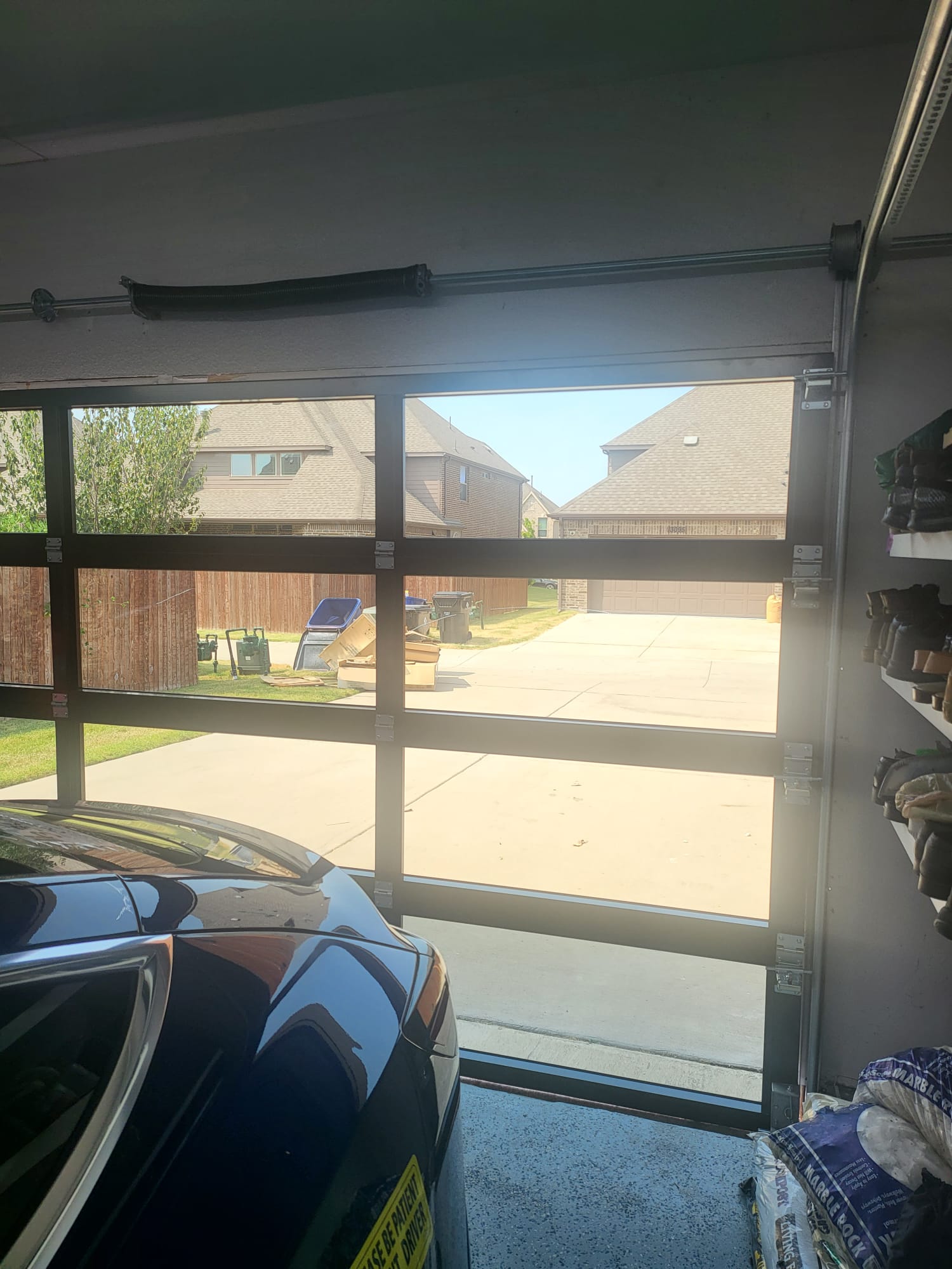 8 by 8 Full View Frameless Garage Door With Black Tinted Tempered Glass