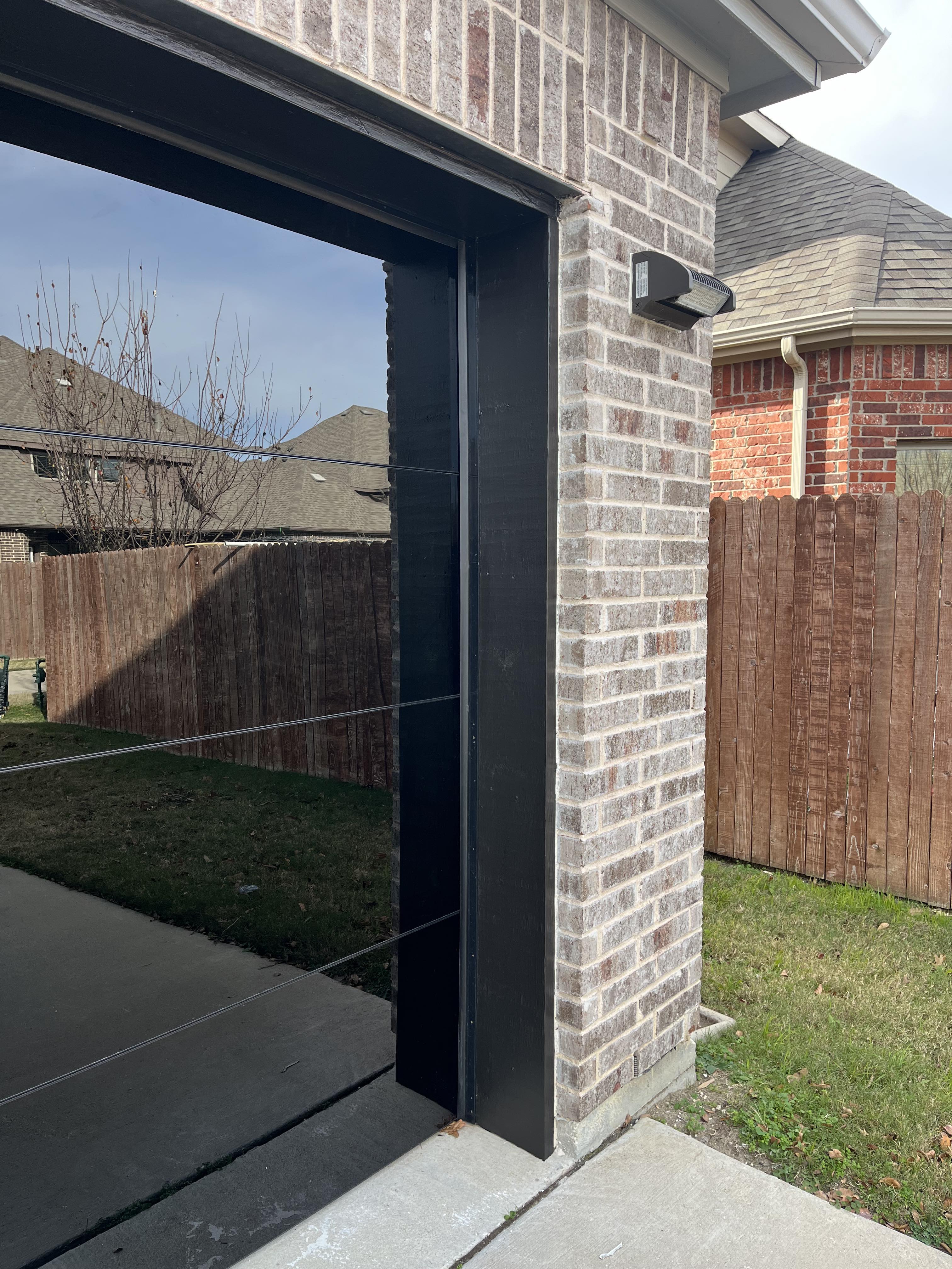 18 by 7 Full View Frameless Garage Door With Black Tinted Tempered Glass