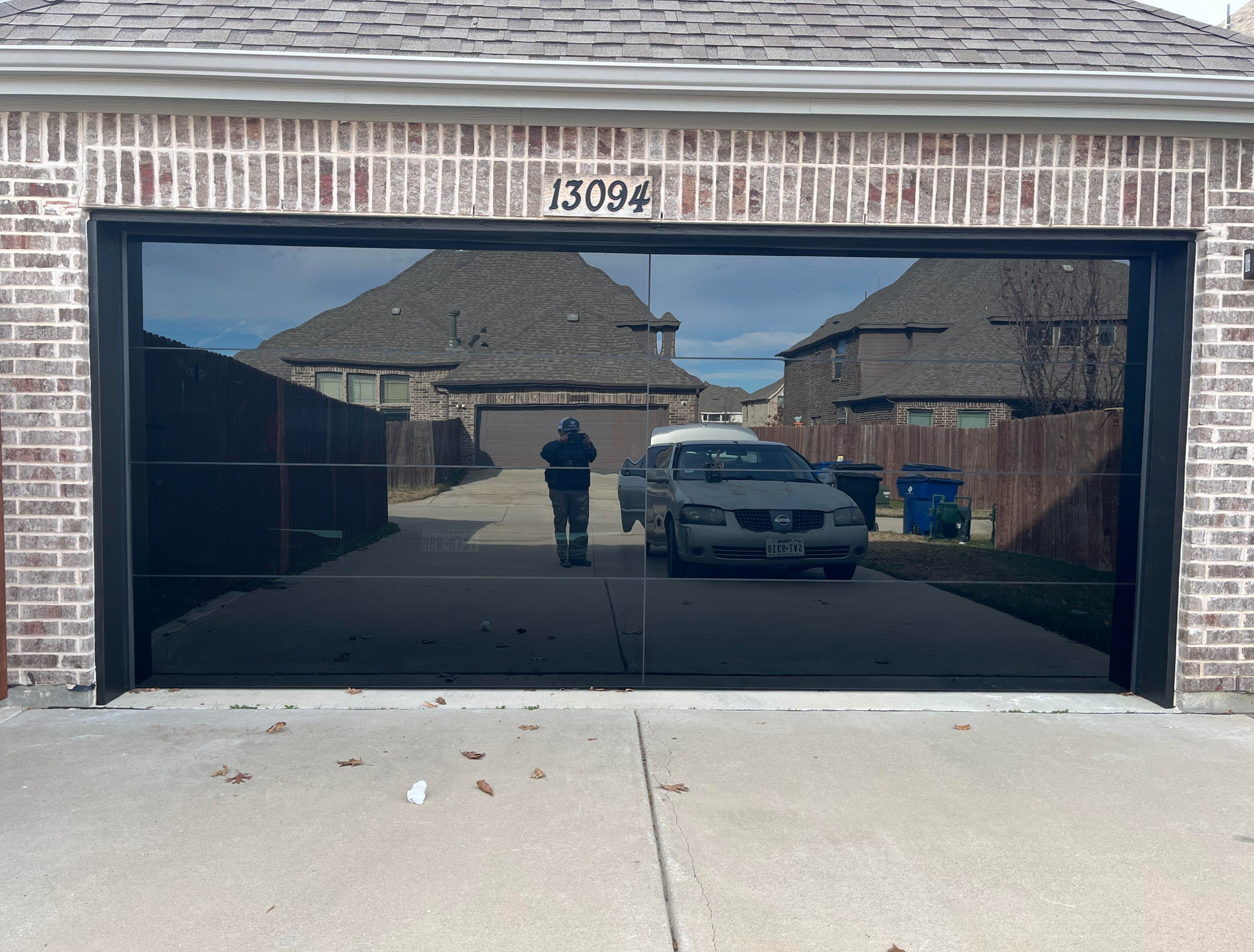 18 by 7 Full View Frameless Garage Door With Black Tinted Tempered Glass