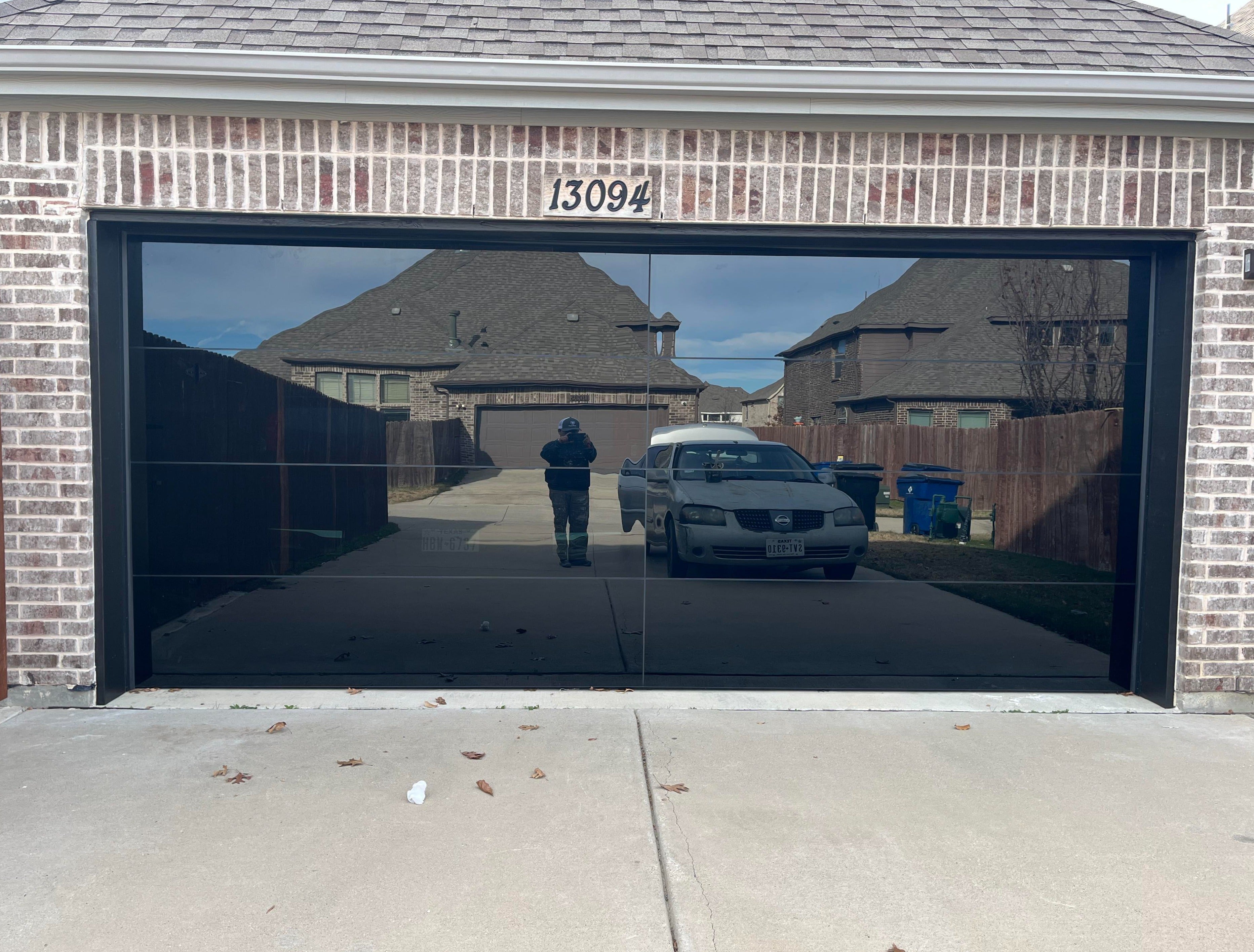 16 by 8 Full View Frameless Garage Door With Black Tinted Tempered Glass